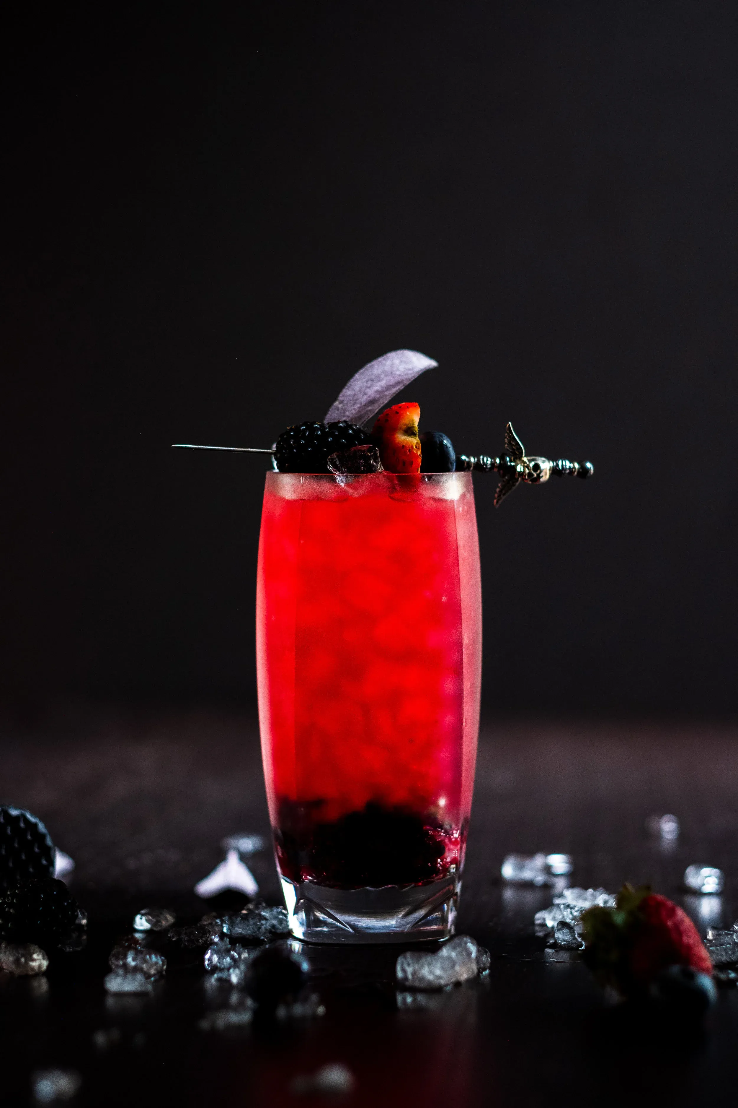 The Tipsy Muse's Cobbler cocktail with fresh berries and sage