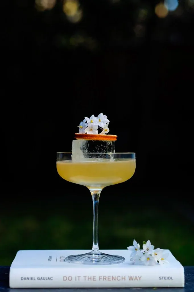 Iron Lady cocktail with book Do It The French Way