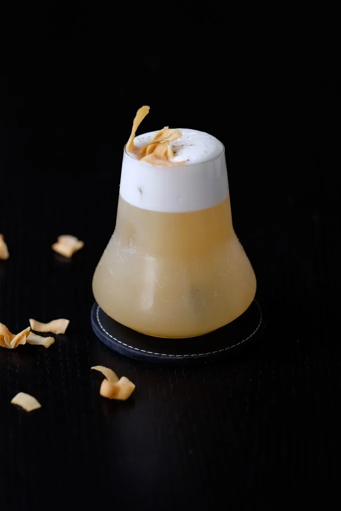 Rum Sour with Fève cocktail