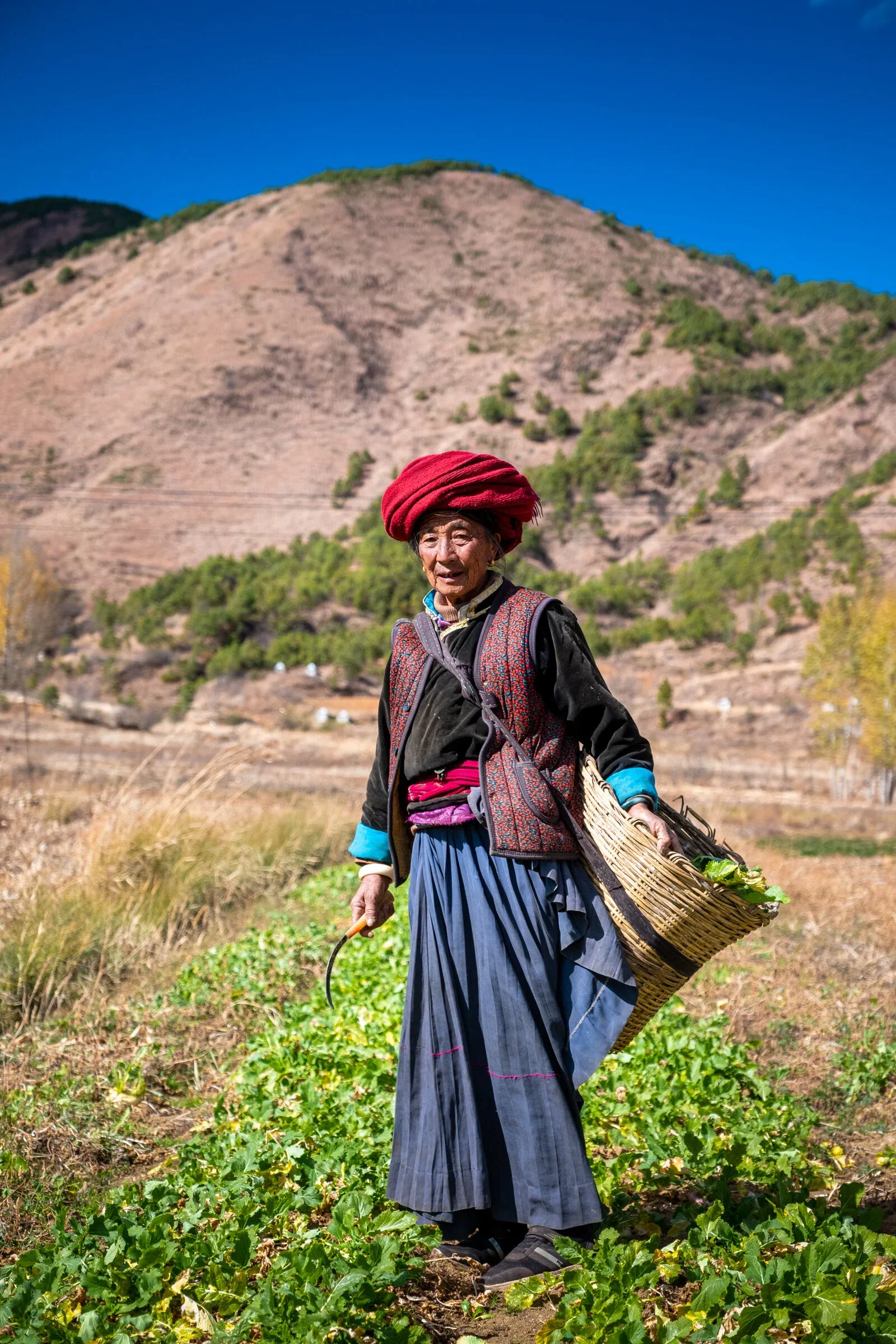 75-year-old Mosuo woman who still farms every day