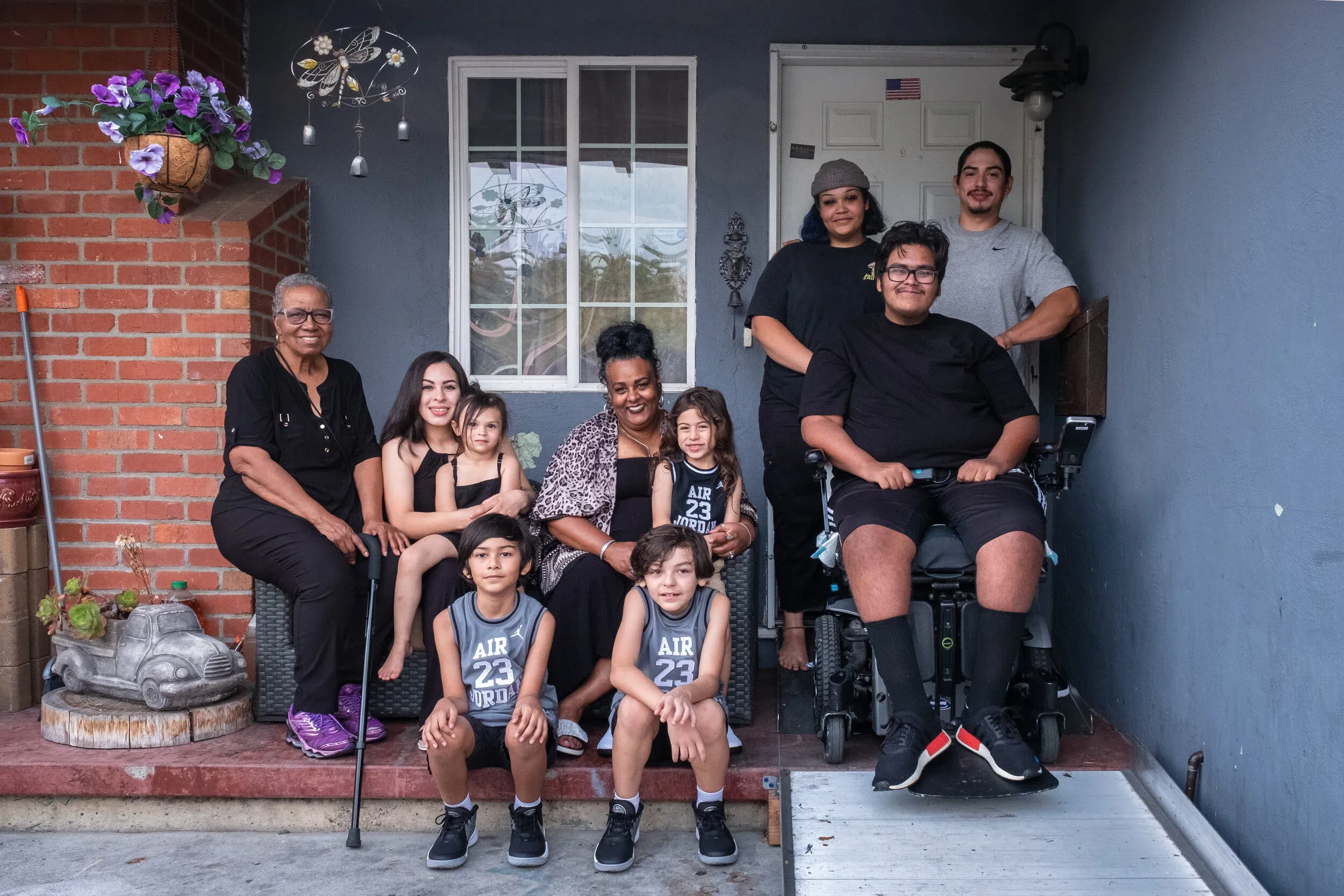 The Martinez family gathered on their front porch