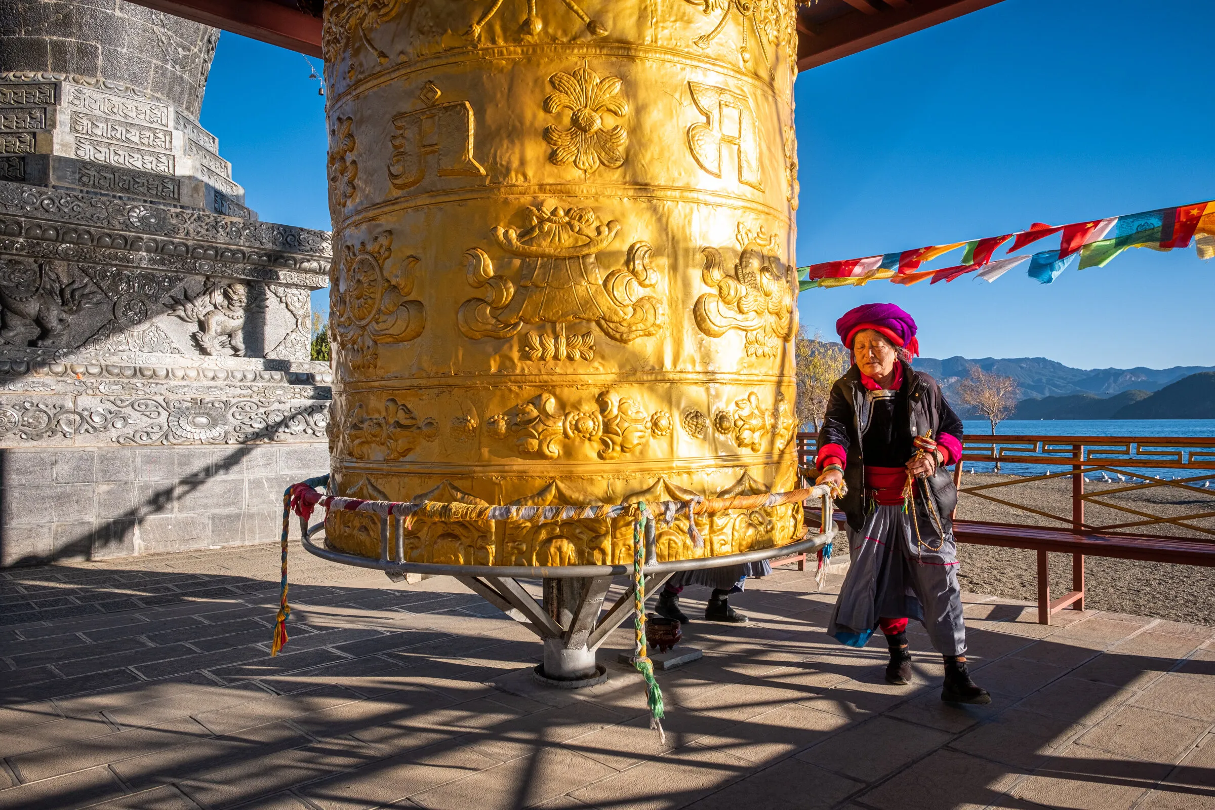 Mosuo woman practicing religious ceremony