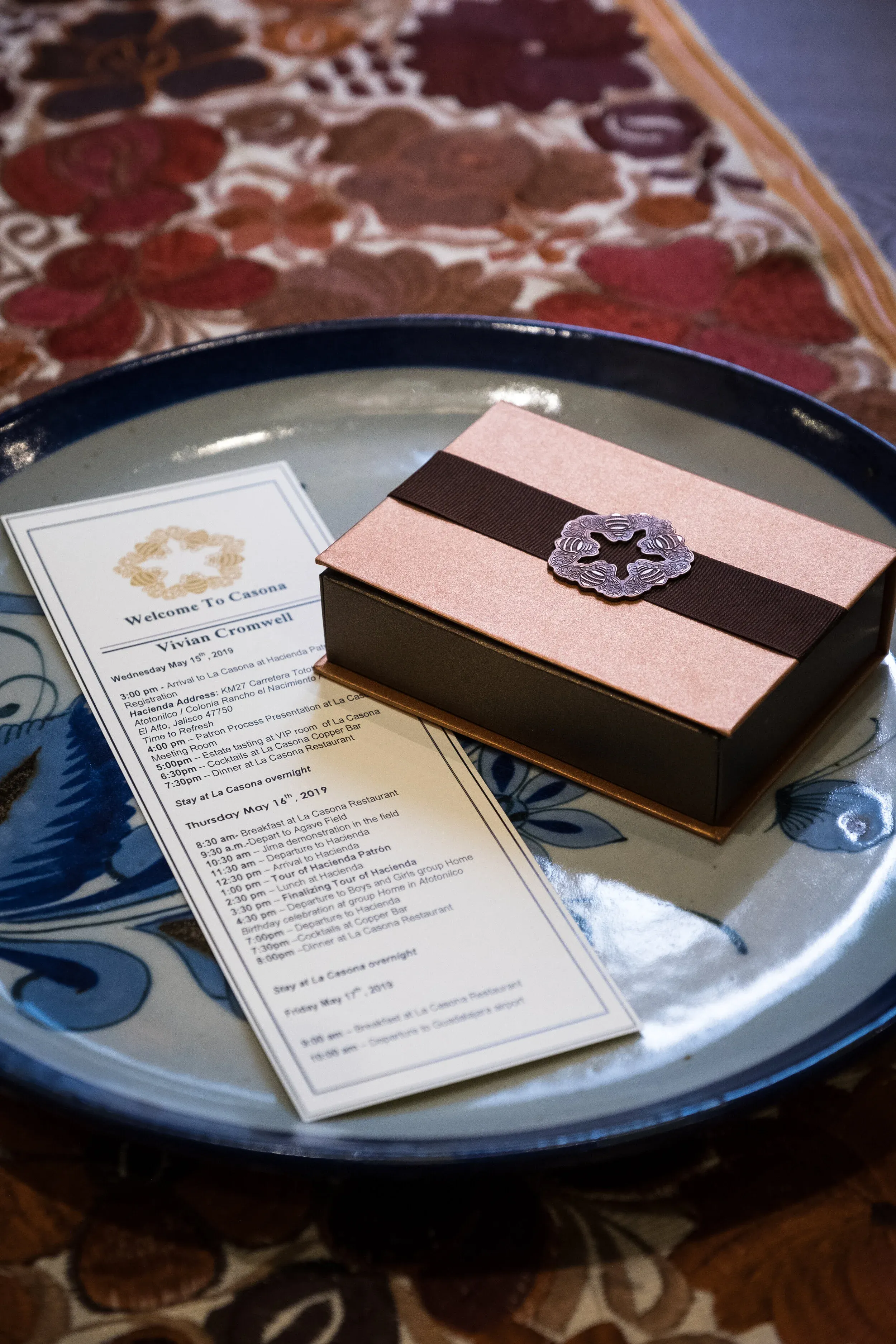 Personalized itinerary card and Patrón chocolates