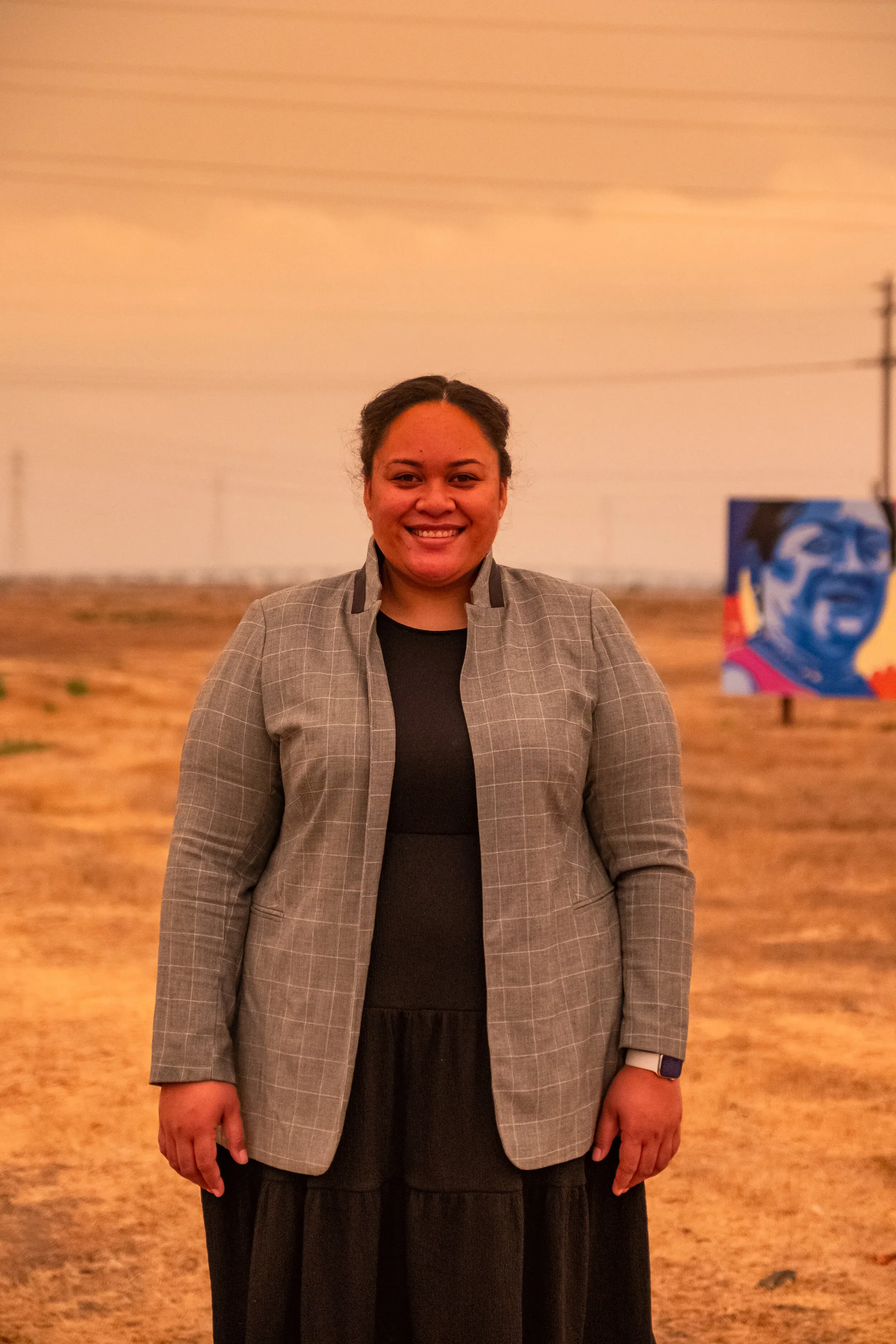 Mele Latu, portrait at Bloomhouse under the orange wildfire sky