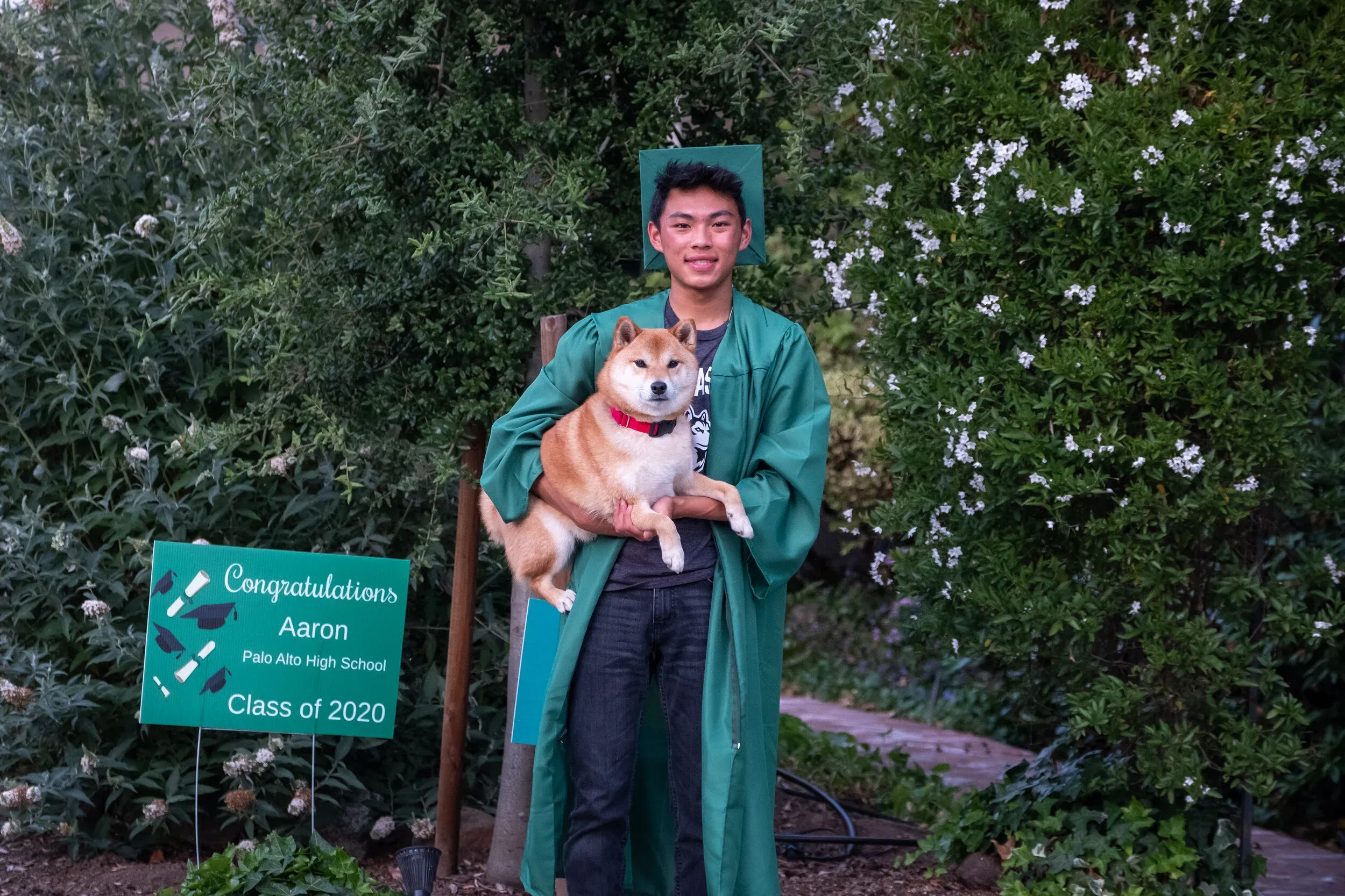 Graduate celebration on front steps in Palo Alto