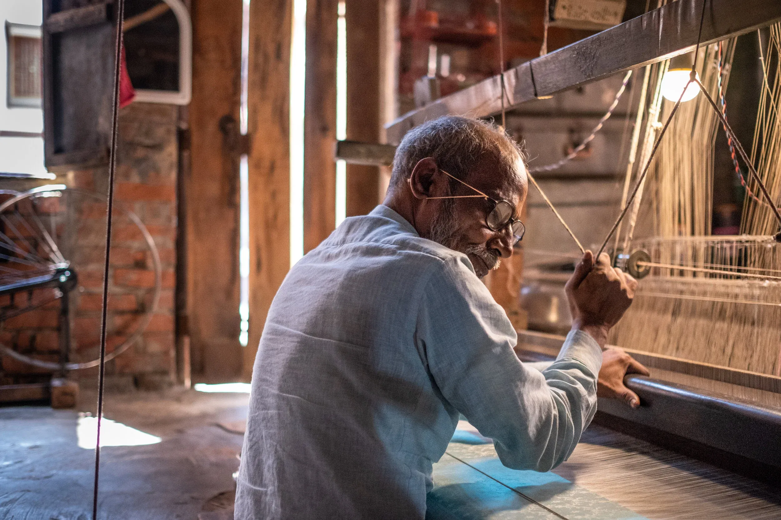 Muslim weaver working at a loom in Varanasi