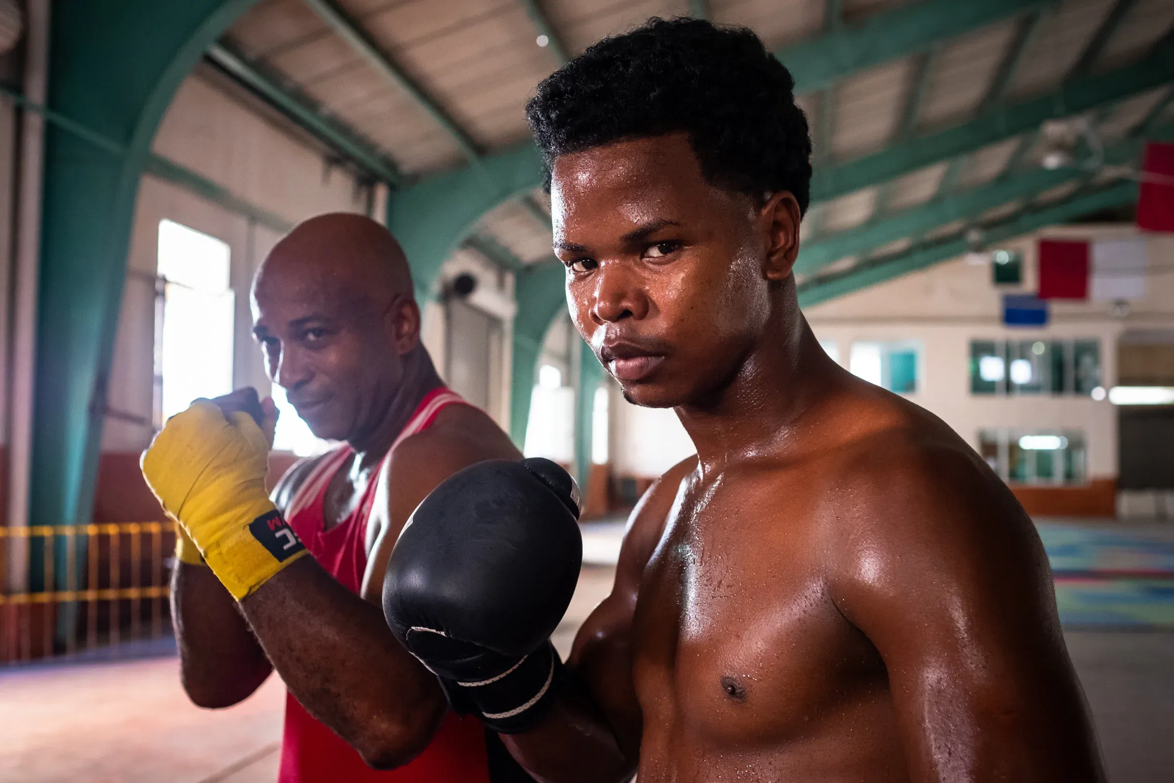Young boxer training at a gym in Havana