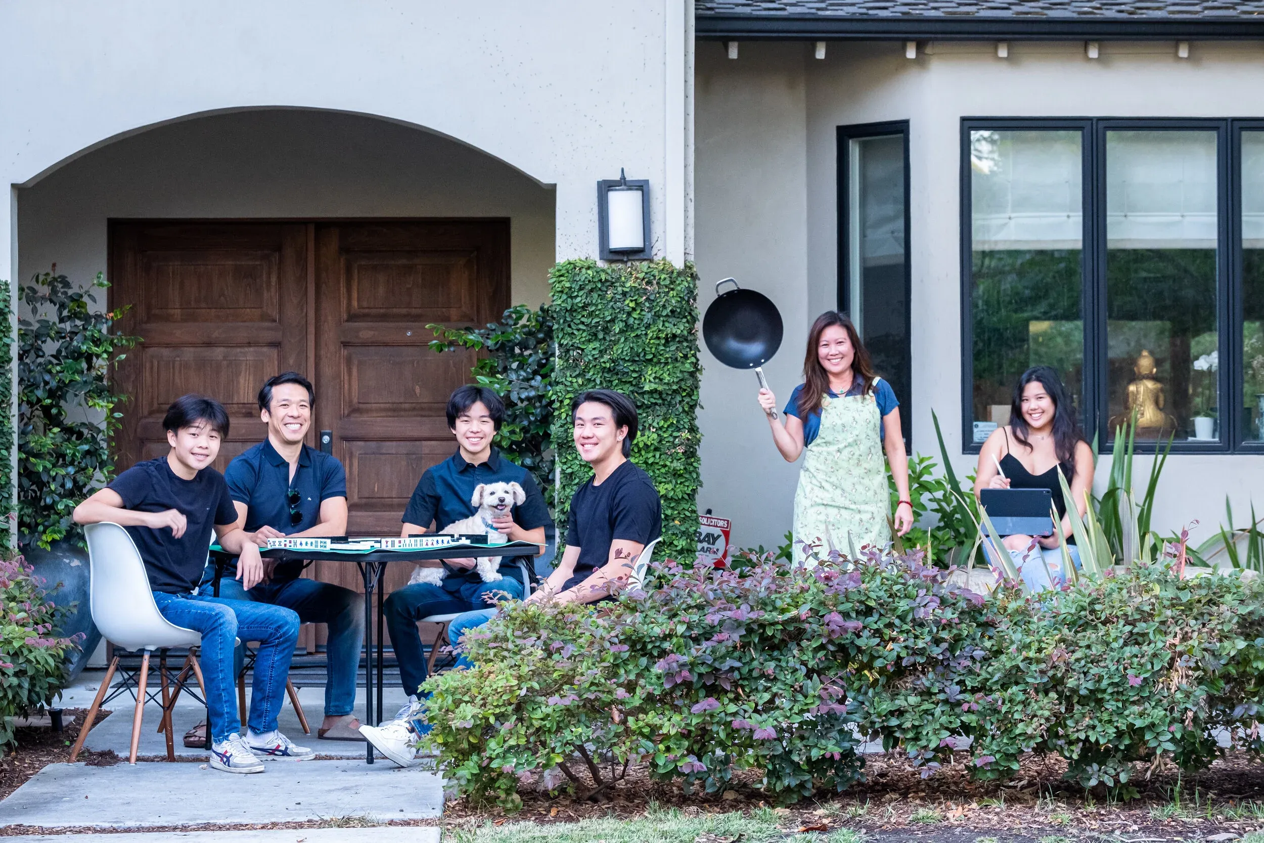 Creative family portrait setup on front steps
