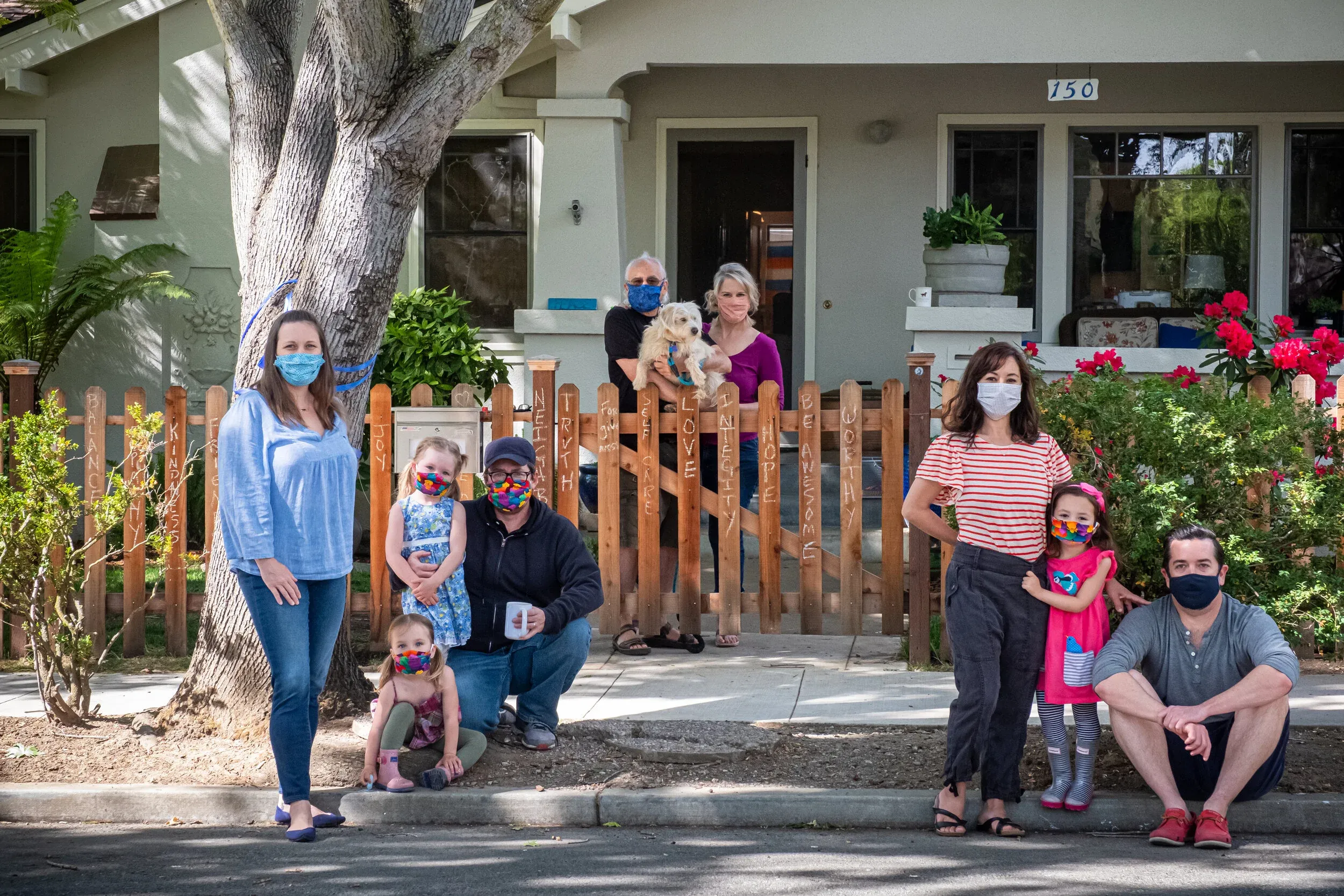 Creative family portrait setup on front steps