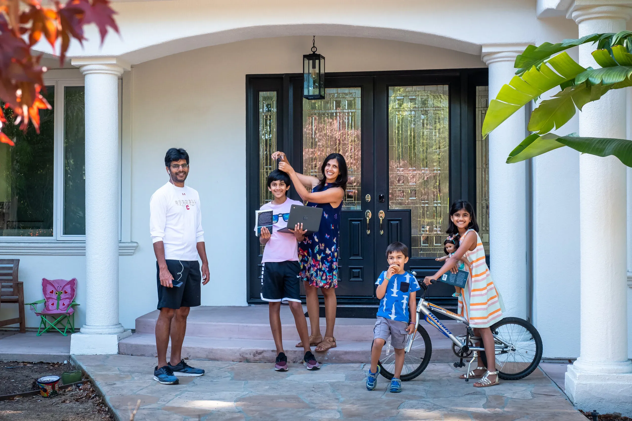Creative family portrait setup on front steps