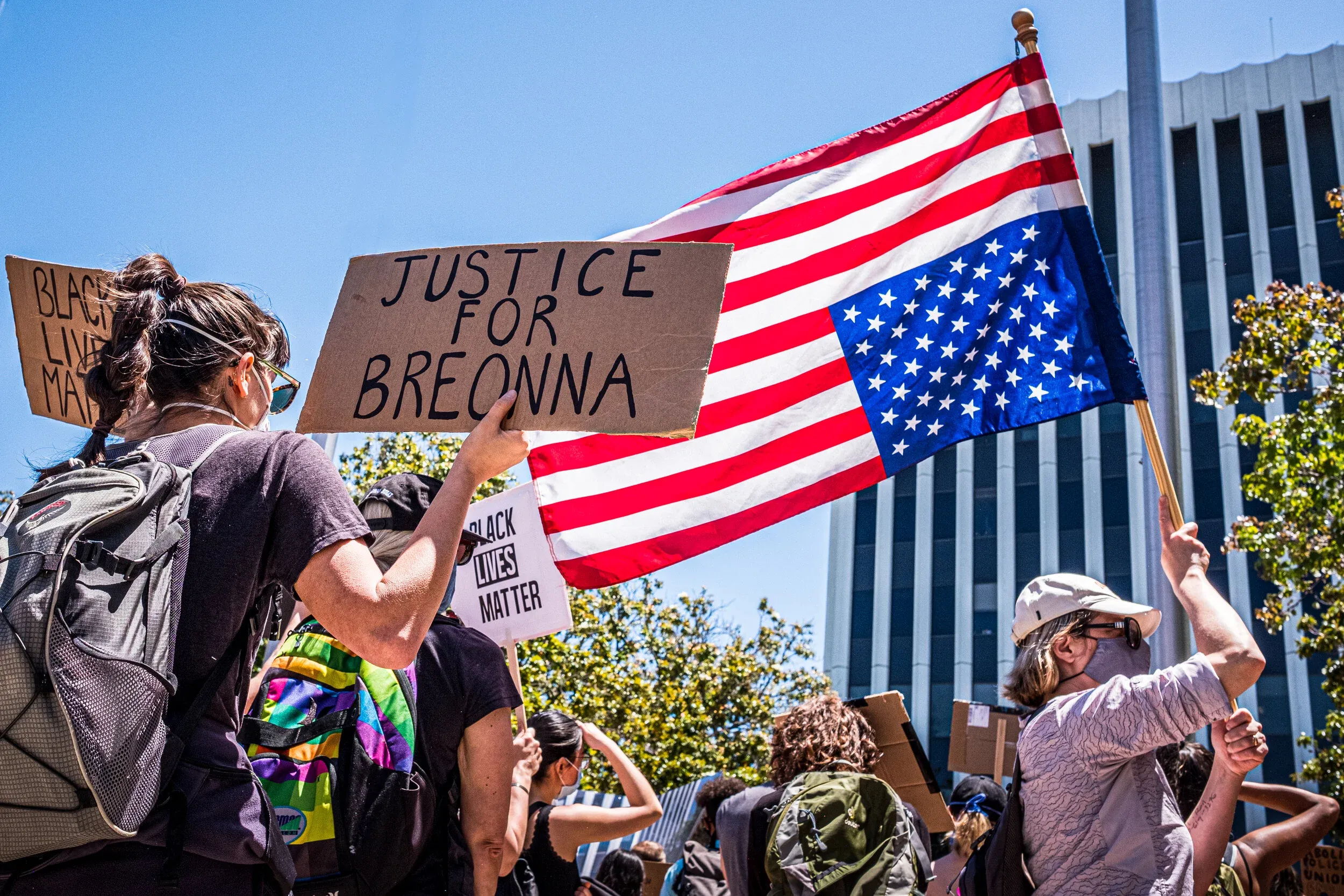 Family supporting Black Lives Matter on front steps